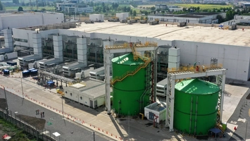 Industrial remediation site with large-scale treatment tanks and processing infrastructure