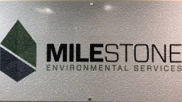 Milestone Environmental Services logo on facility signage